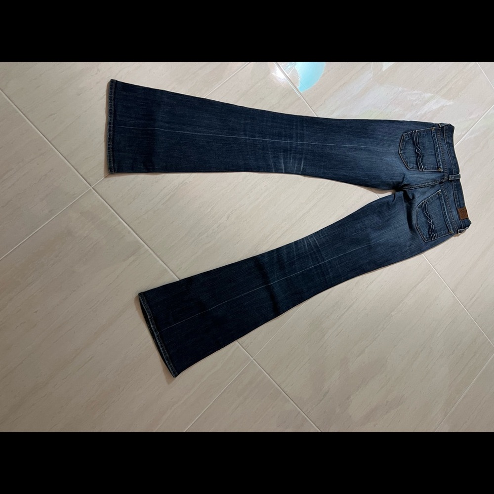 Lucky brand dark wash flare jeans, size 24, 34 long. Like new condition.